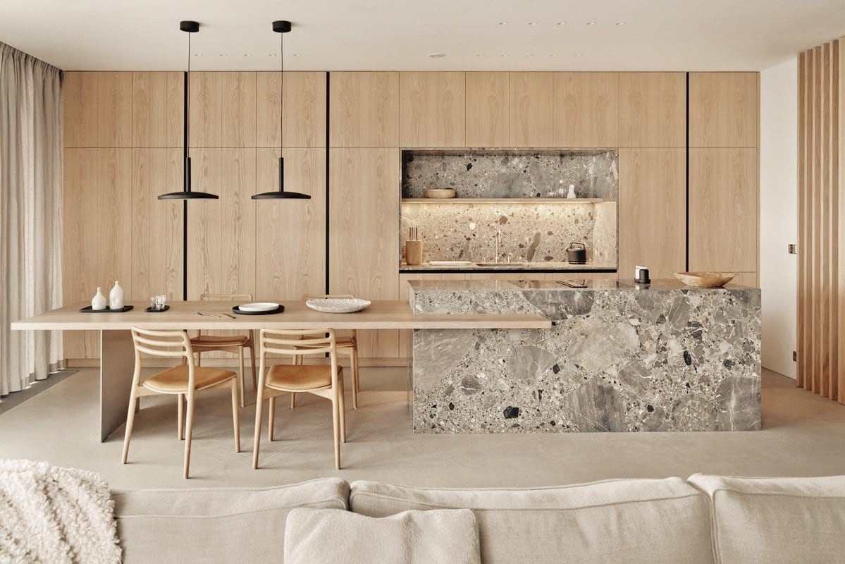 Cocina moderna con isla revestida en piedra Ceppo Kode, parte de la colección Pietra Kode de Dekton by Cosentino.